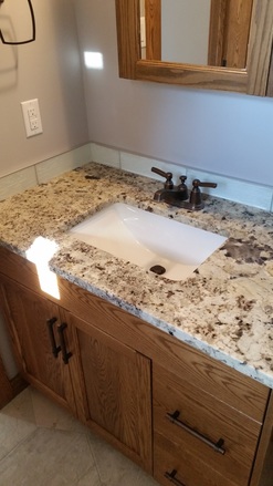 bathroom sink with 2 drawer cabinets