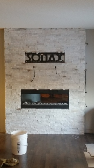 white stone with see through fireplace