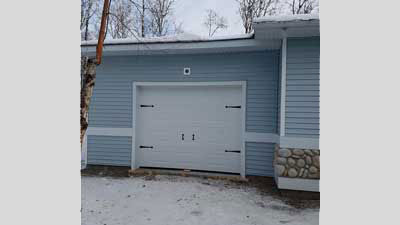 light blue and white attached garage
