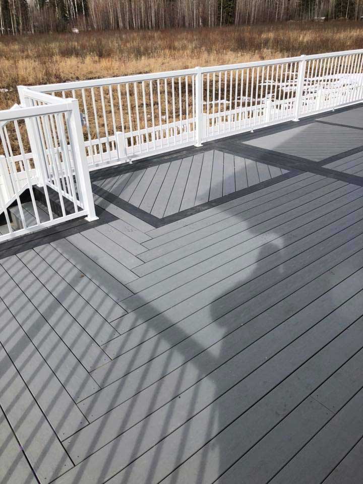Gray diagonal design PVC decking with charcoal accents