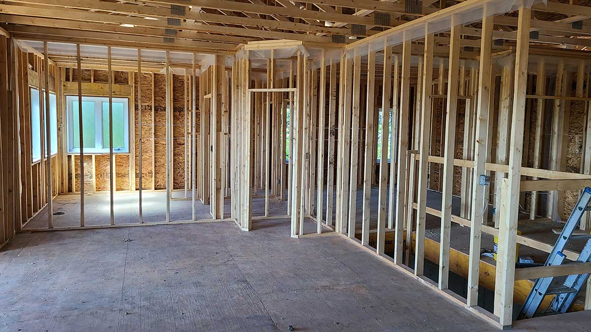 Rough in stage of new home build showing studs and framing for pantry