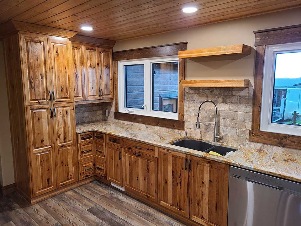 Hickory kitchen cabinets with granite countertop and floating shelves