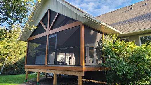 Covered screened in deck with hot tub